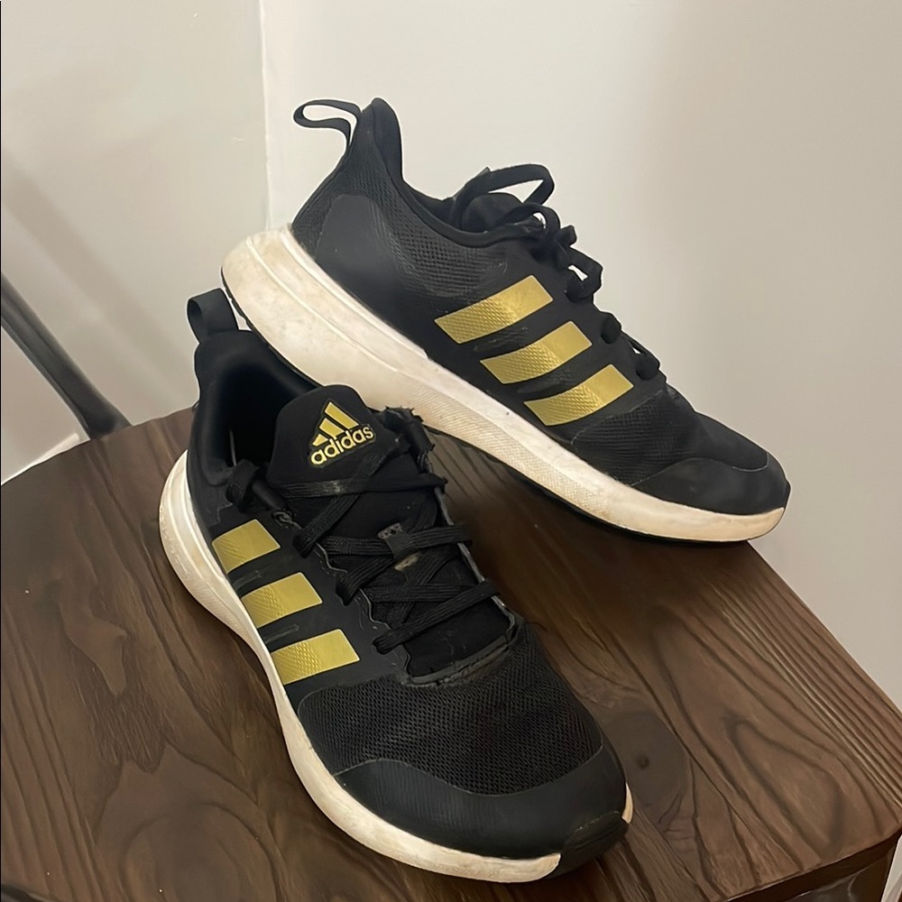 Adidas Black and Gold Athletic Shoes with Cushioned Midsole